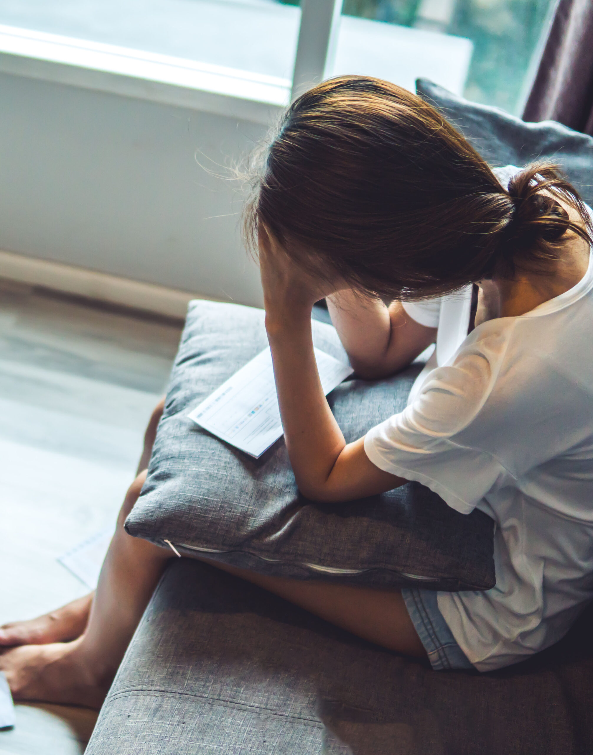 Young women worried about bills and debr stacking up. Unable to